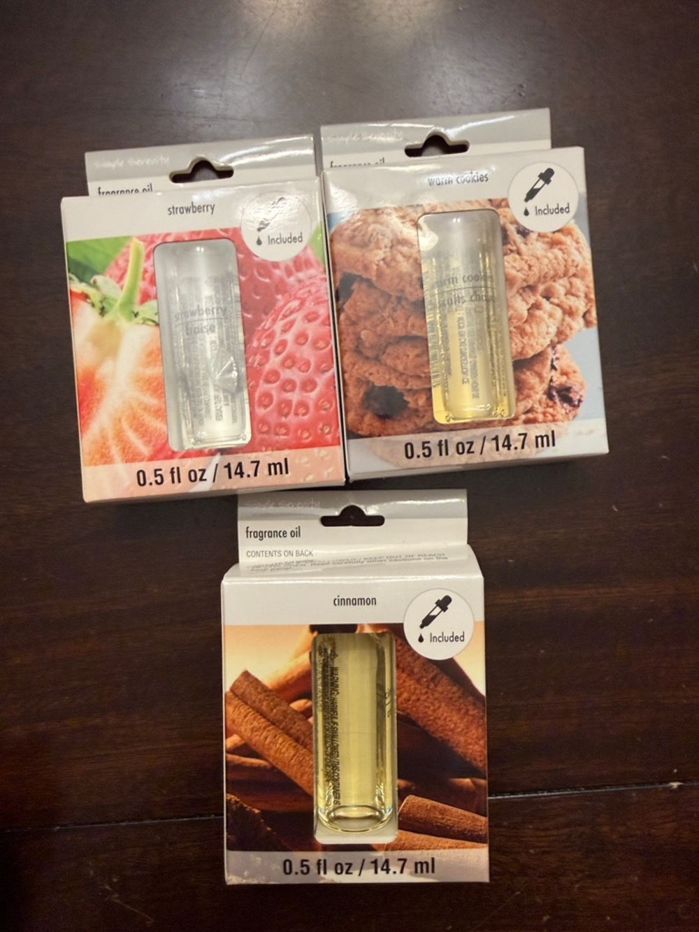 3 Serenity Fragrance essential oils.  Cinnamon, strawberry and warm cookies